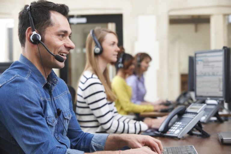 Customer service agents with headphones