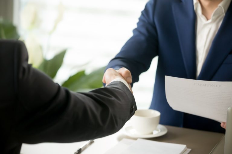 people shaking hands, business deal concept