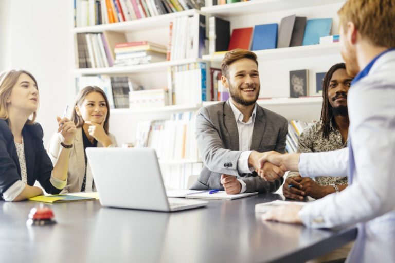 Businessman and client handshake